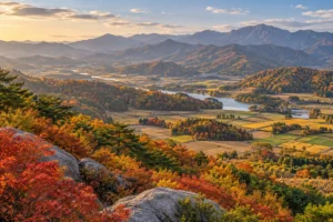 低い山並みと畑が広がる韓国高原をイメージしたAI概念画像